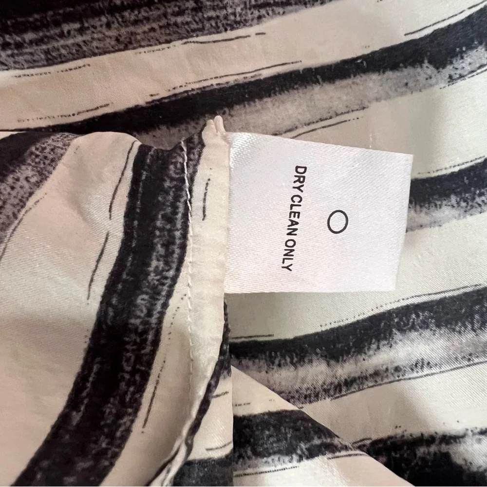 100% silk black|white collared, button-up blouse, size sm-med. short sle…
